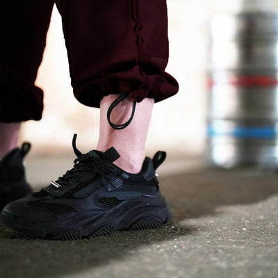 Rebellion Womens Joggers in Black - JOGGERS front view